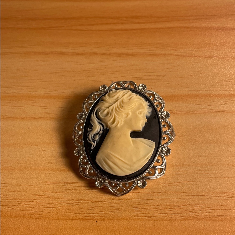 Elegant Silver and Cream Cameo Brooch